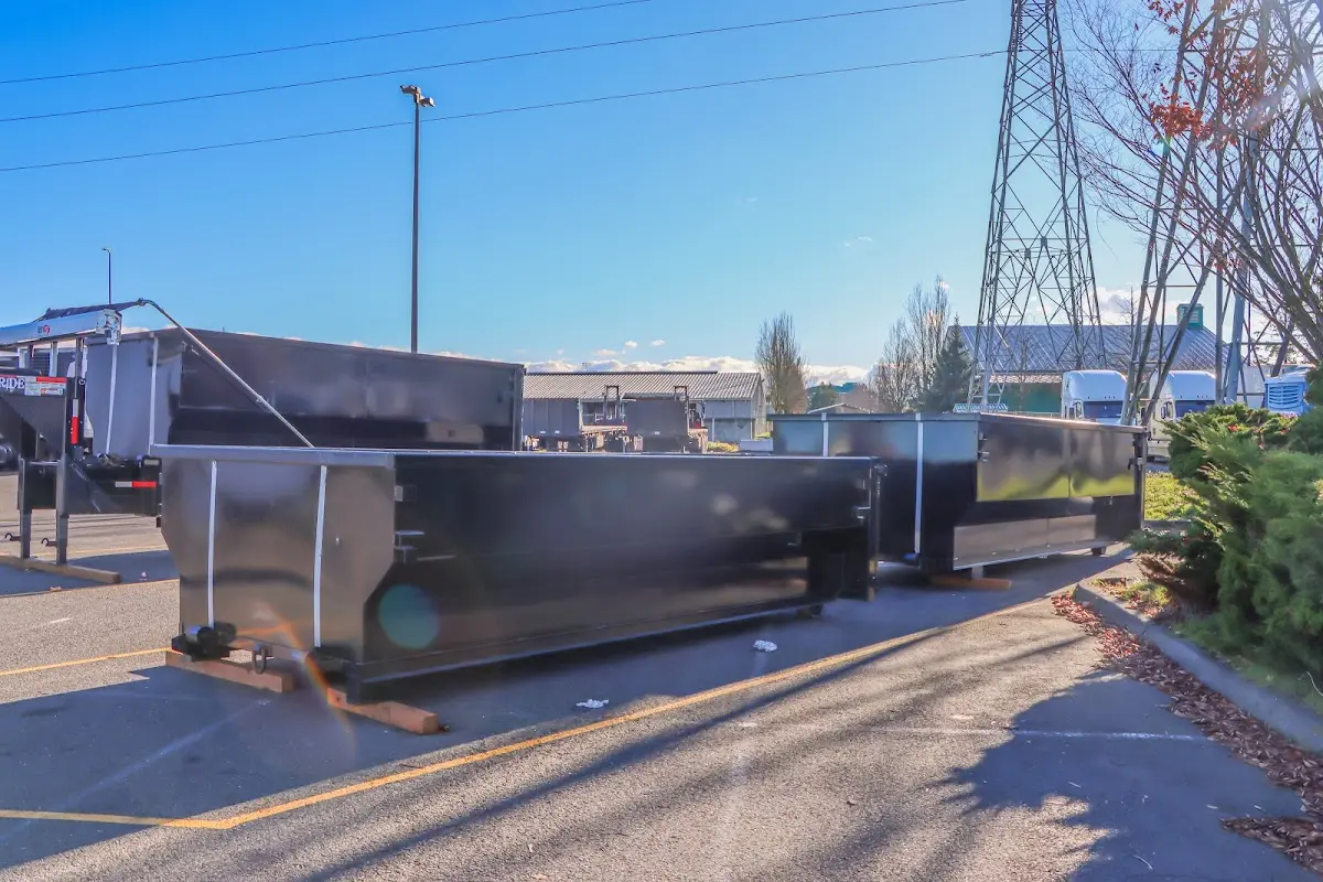Roll-off dumpster ready for waste disposal at job site for 2 Yard Dumpster Rental in Rosedale